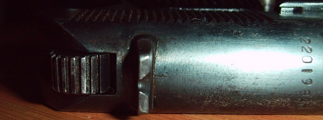 hammer lowered on live round